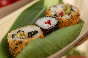 sushi on bamboo bowl boat