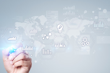 Applications icons and graphs on virtual screen. Business, internet and technology concept.