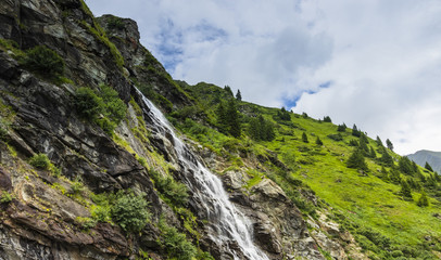 Fototapeta na wymiar Romania Karpaty waterfall on the Transfogaraska route