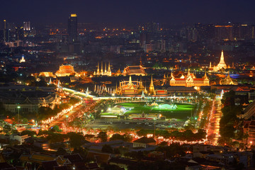 aerial view of royal grand palace and night cityscape background