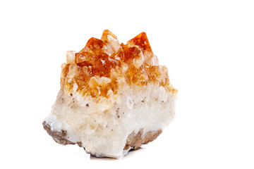 Macro mineral stone Citrine in rock in crystals on a white background