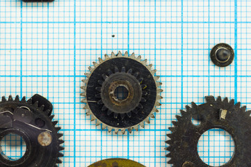 parts old retro film SLR camera on graph paper