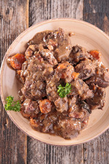 beef cooked with red wine, boeuf bourguignon