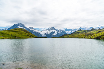  Bachalpsee lake with Schreckhorn and Wetterhorn at Grindelwald in Switzerland