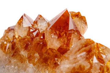 Macro mineral stone Citrine in rock in crystals on a white background