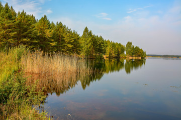 Artificial lake formed after the removal of sand. Closed sand quarry.