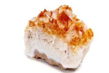 Macro mineral stone Citrine in rock in crystals on a white background