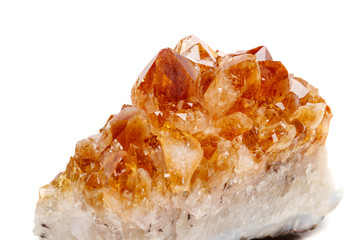 Macro mineral stone Citrine in rock in crystals on a white background