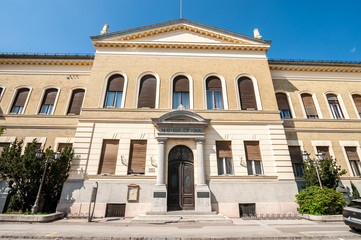 Fototapeta na wymiar Entrance windows and front facade of historical building of Matica Srpska translation - Serbian Association, built in 1826.