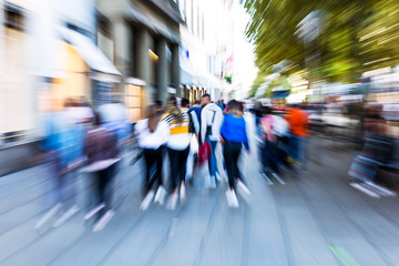 creative zoom picture of crowds of people in the city