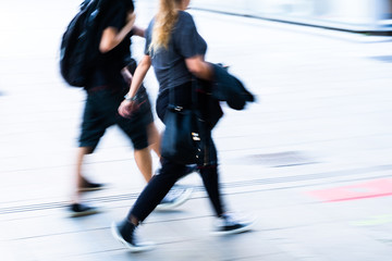 Obraz premium picture in motion blur of people walking in the city
