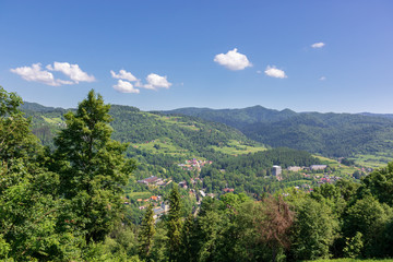 Fototapeta na wymiar Beautiful Pieniny, view from Palenica to a small spa town - Szczawnica