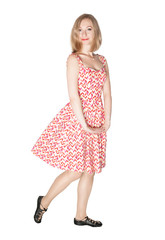 Young beautiful blond woman in dress isolated