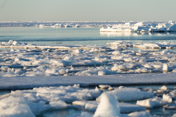 Kayakers enjoying an evening paddle on the Arctic Ocean