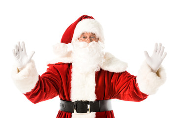 emotional santa claus gesturing with hands while looking at camera isolated on white