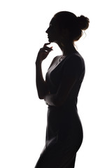 profile of beautiful girl with hand-picked hair, silhouette of a woman on a white isolated background