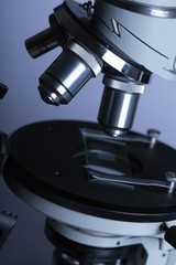 Closeup of Microscope Lenses and Slide