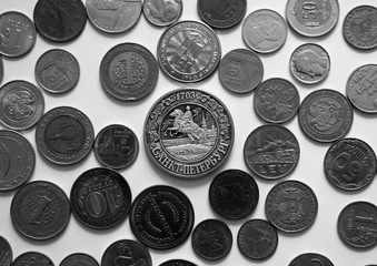 Money from different countries.  Metal ancient coins. Loose change. The symbolism of St. Petersburg on money. Copper, silver and gold coins. Wealth and abundance.