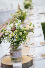Wedding or Birthday Reception, table decoration with fresh flowers
