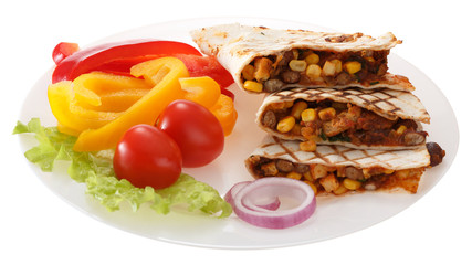 Tortilla stuffed with meat with corn and beans grilled. The portion is served on a plate. Decorated with tomatoes, sweet pepper and salad. Isolated on white background.