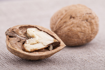 Walnuts on textile background close up group