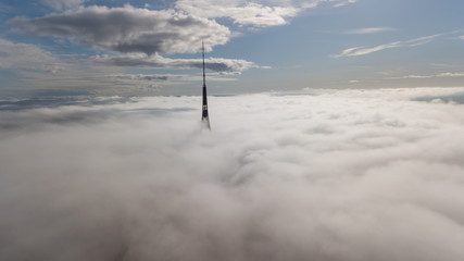 Riga Latvia Tv Tower Zakusala smoke clouds Europe biggest Aerial drone top view