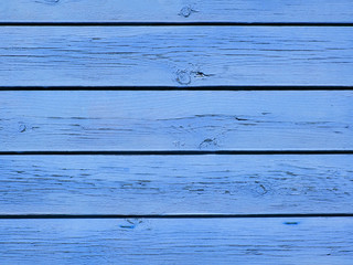Old blue cracked wood planks.