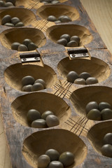 Traditional African oware game with seeds