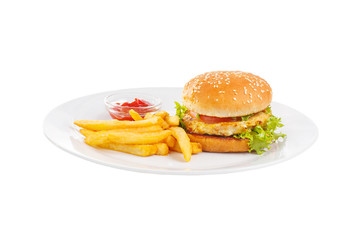 Burger with fish, chicken cutlet, tomato, French fries and ketchup, barbecue sauce. Side view. Serving for a cafe, a restaurant in the menu. Isolated, white background on plate