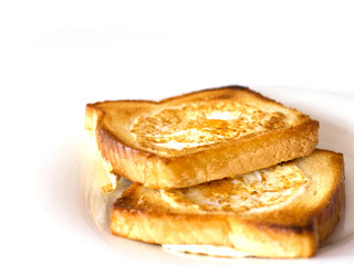 Toasted bread fried with egg inside. Isolated