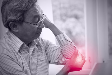 asian senior elder elbow pain elderly health concept