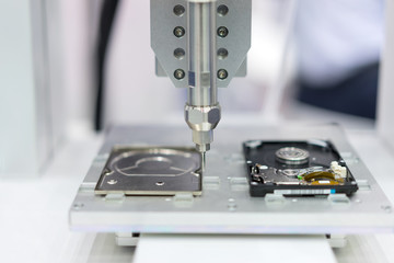 Computer hard drive assembly by automatic high precision machinery in the factory