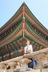 Beautiful Korean woman dressed Hanbok in Gyeongbokgung Palace in Seoul