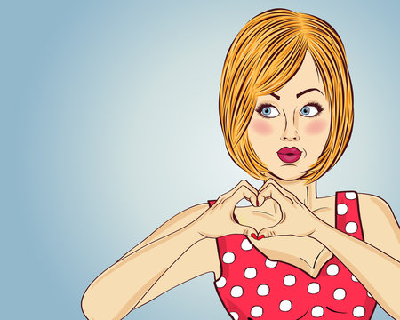 Blonde pop art woman making heart sign with hands. Comic woman . Pin up girl.