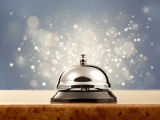 Vintage hotel reception service desk bell.