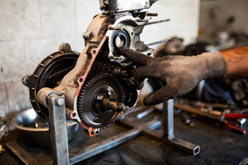 Fototapeta premium Motorcycle Mechanic at Work