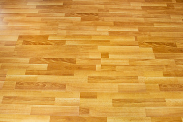 Luxury laminate wood floor from top angle view showing the beautiful wood detail.
