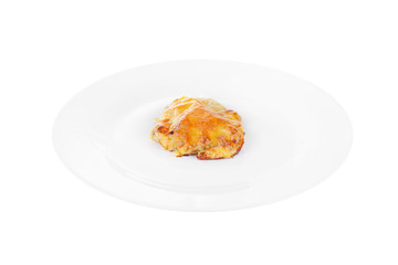 Meat, pork, beef, chicken, fish baked under a crust of mayonnaise and cheese on a plate, isolated on white background. Side view. Serving for a cafe, a restaurant in the menu