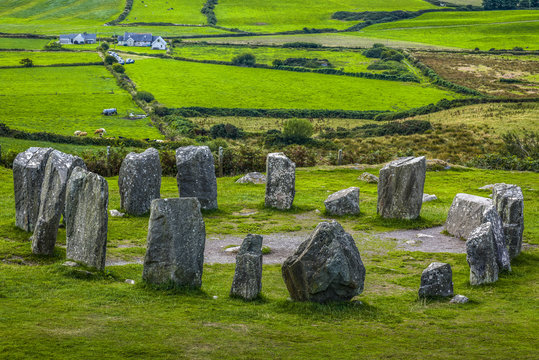 Closeup of Drombeg Stone Circle  on a green meadow in summer, County Cork, Ireland