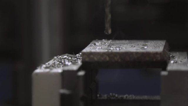 Drilling Machine, cnc machine. Close up robot hands in milling and drilling metalworking process,mechanical turning metal working ,metal work Industrial. Equipment for metal processing in the modern