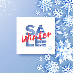 Winter Sale Banner. Merry Christmas and Happy New Year Greetings card. White Paper cut snowflakes. Origami Winter Decoration background. Seasonal holidays. Snowfall. Space for text. Blue.
