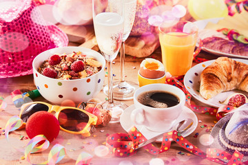 Carnival breakfast with party accessories