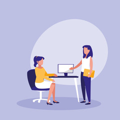 group of women with desktop in workplace