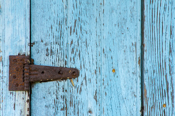 details of an old barn entrance gnawed by passing time