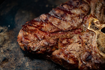Ribeye steak on grill in meat restaurant