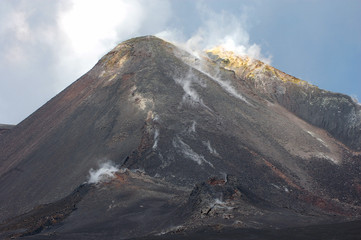 Volcano Etna Sicily Italy peak with steam and sulfur