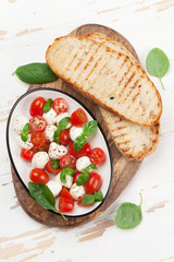 Caprese bruschetta toasts cooking