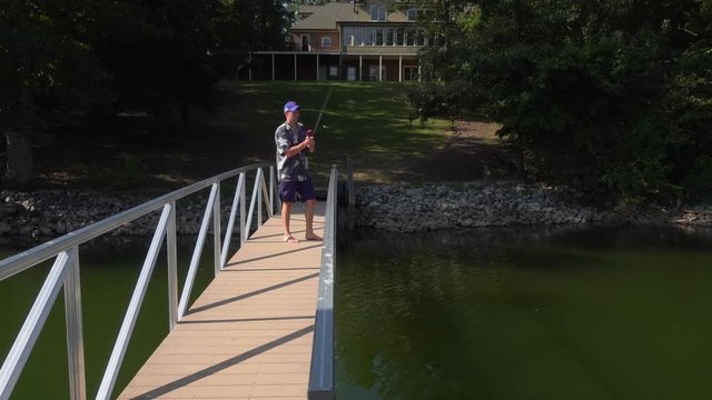 Fishing At The Lakehouse From The Pier.