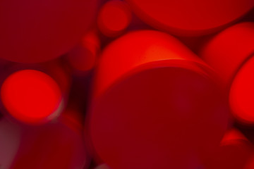 fondo de formas circulares en movimento de colores rojo, blanco y lila.