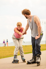 roller skater couple skating outdoor